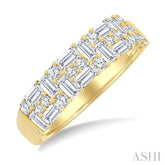 1 1/10 Ctw Baguette and Round Cut Diamond Fashion Band in 14K Yellow Gold