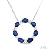 4x3 MM Oval Cut Sapphire and 1/4 Ctw Round Cut Diamond Circle Pendant With Chain in 14K White Gold