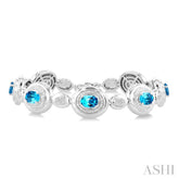 7X5 MM Oval Shape Blue Topaz and 1/10 Ctw Round Cut Diamond Bold Bracelet in Sterling Silver