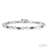 4x3 MM Oval Cut Sapphire and 1/10 Ctw Round Cut Diamond Bracelet in 10K White Gold