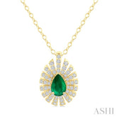 1/3 Ctw Starburst 6X4MM Pear Cut Emerald and Round Cut Diamond Precious Pendant With Chain in 14K Yellow Gold