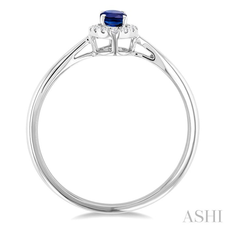 5x3 MM Oval Shape Sapphire and 1/20 Ctw Round Cut Diamond Halo Precious Ring in 10K White Gold