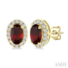 5x3 MM Oval Shape Garnet and 1/8 Ctw Round Cut Diamond Halo Semi-Precious Stud Earrings in 14K Yellow Gold