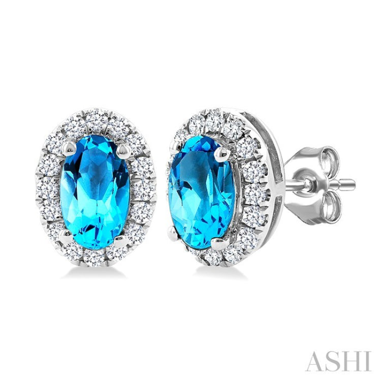 5x3 MM Oval Shape Blue Topaz and 1/8 Ctw Round Cut Diamond Halo Semi-Precious Stud Earrings in 10K White Gold