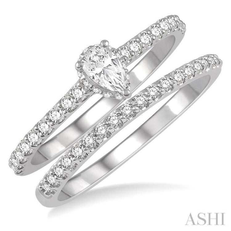 3/4 Ctw Diamond Wedding Set With 5/8 Ct Pear Cut Diamond Engagement Ring and 1/6 Ct Wedding Band in 14K White Gold