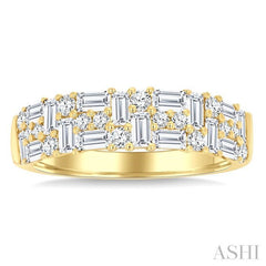 1 1/10 Ctw Baguette and Round Cut Diamond Fashion Band in 14K Yellow Gold