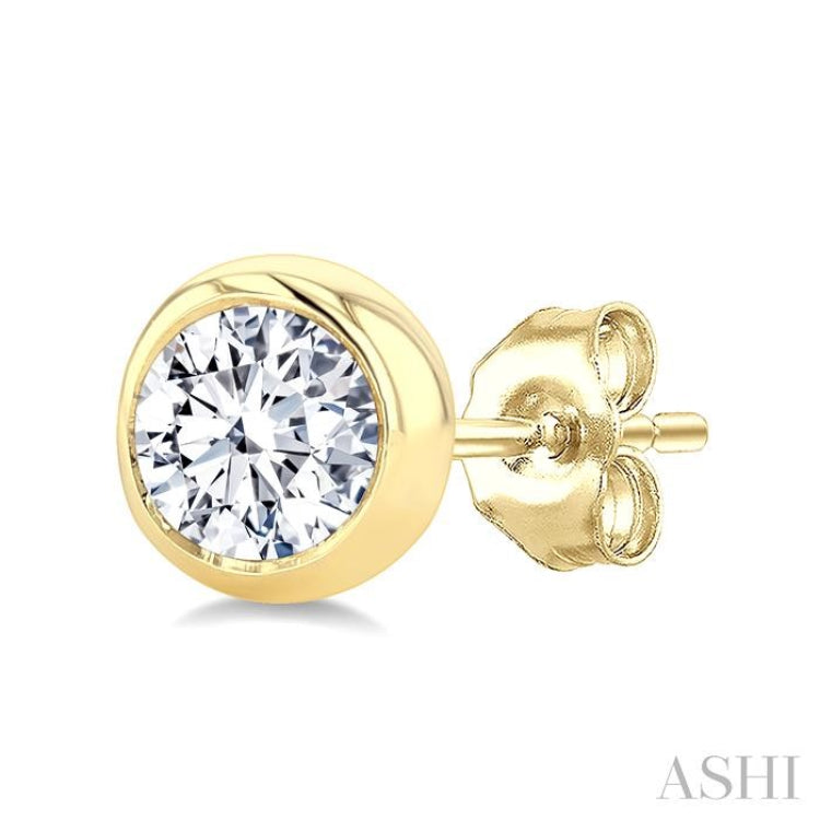 1/4 Ctw Bezel Set Round Cut Diamond Stud Earrings in 14K Yellow Gold
