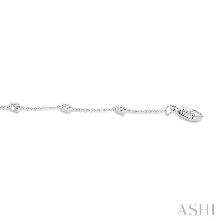 1/10 Ctw Petite Heart Round Cut Diamond Station Bracelet in 10K White Gold