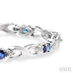 4x3 MM Oval Cut Sapphire and 1/10 Ctw Round Cut Diamond Bracelet in 10K White Gold