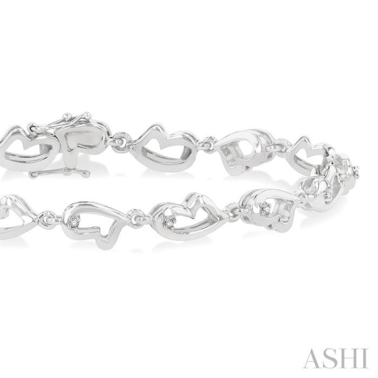 1/20 Ctw Heart Shape Round Cut Diamond Bracelet in Sterling Silver