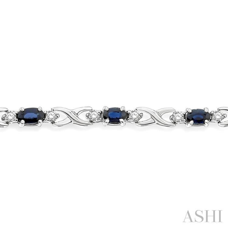 5x3 MM Oval Cut Sapphire and 1/10 Ctw Round Cut Diamond Bracelet in 10K White Gold