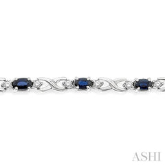 5x3 MM Oval Cut Sapphire and 1/10 Ctw Round Cut Diamond Bracelet in 10K White Gold