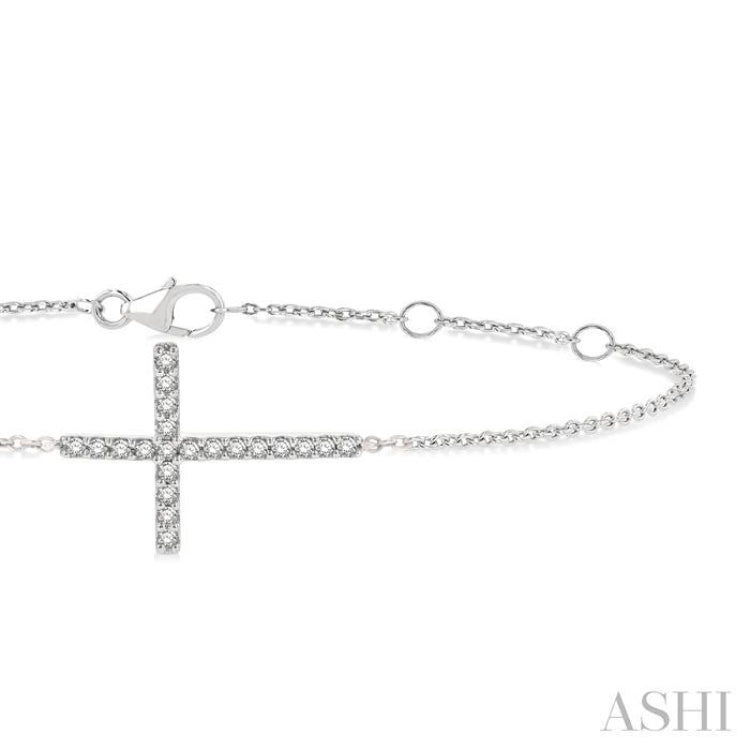 1/8 Ctw Petite Reclined Cross Round Cut Diamond Fashion Bracelet in 10K White Gold