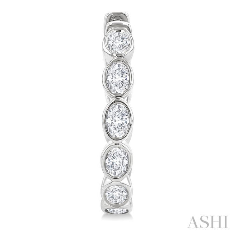 1 1/10 Ctw Bezel Set Oval Cut Diamond Fashion Hoop Earring in 14K White Gold