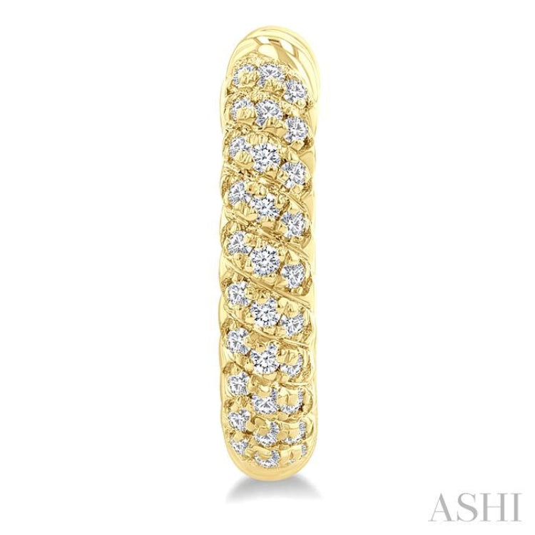 1/5 Ctw Petite Swirl Pattern Round Cut Diamond Fashion Huggies in 10K Yellow Gold