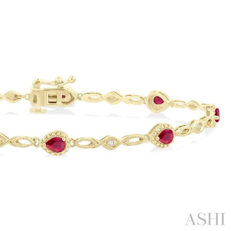 4X3 MM Pear Cut Ruby and 1/20 Ctw Round Cut Diamond Precious Fashion Bracelet in 10K Yellow Gold