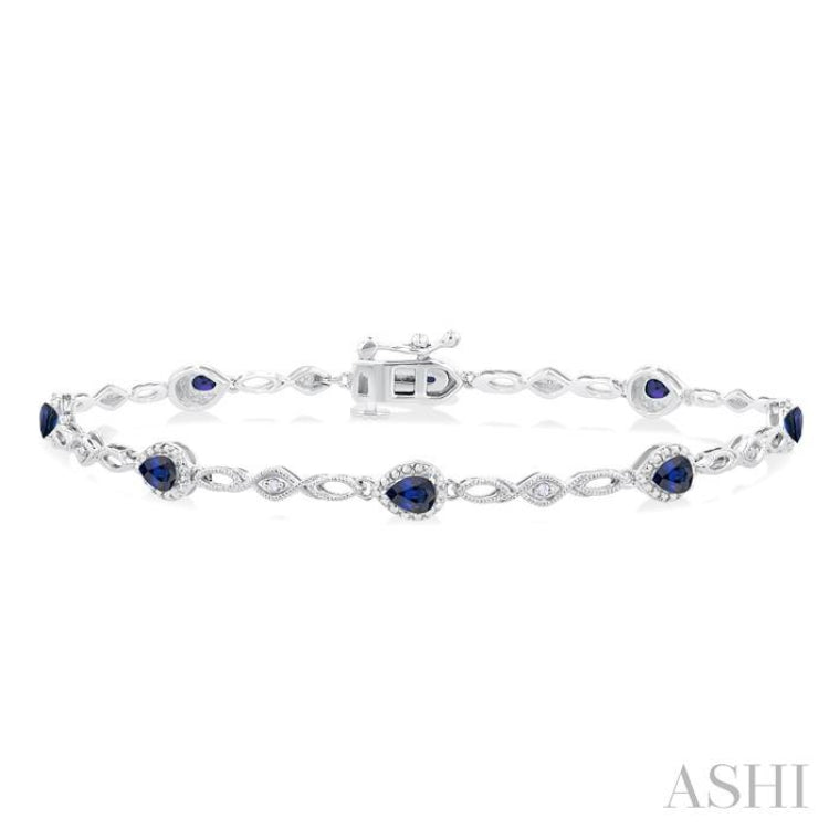 4X3 MM Pear Cut Sapphire and 1/20 Ctw Round Cut Diamond Precious Fashion Bracelet in 10K White Gold